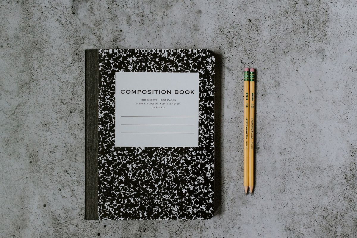 A quiet consultation room with a notebook and cup of tea on the table, set up for an unhurried conversation rather than a clinical exam, photo by Kelly Sikkema on Unsplash