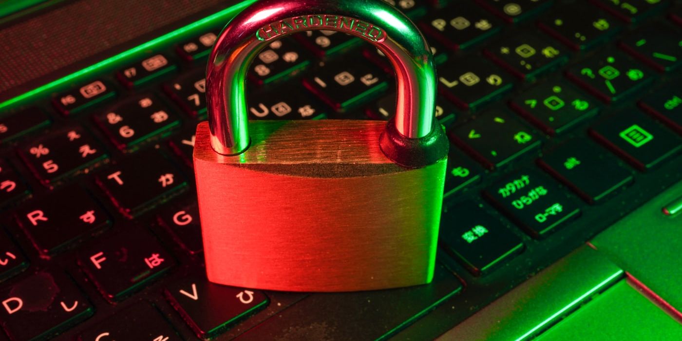 Close-up of a laptop with a padlock security icon — protecting business data when using AI tools