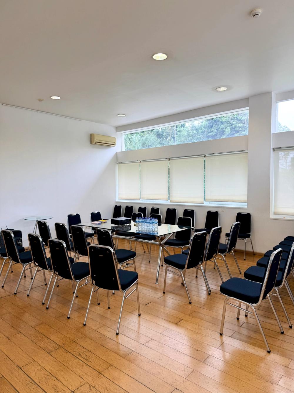 The Dahlia Room in theatre layout, with rows of chairs facing a small table