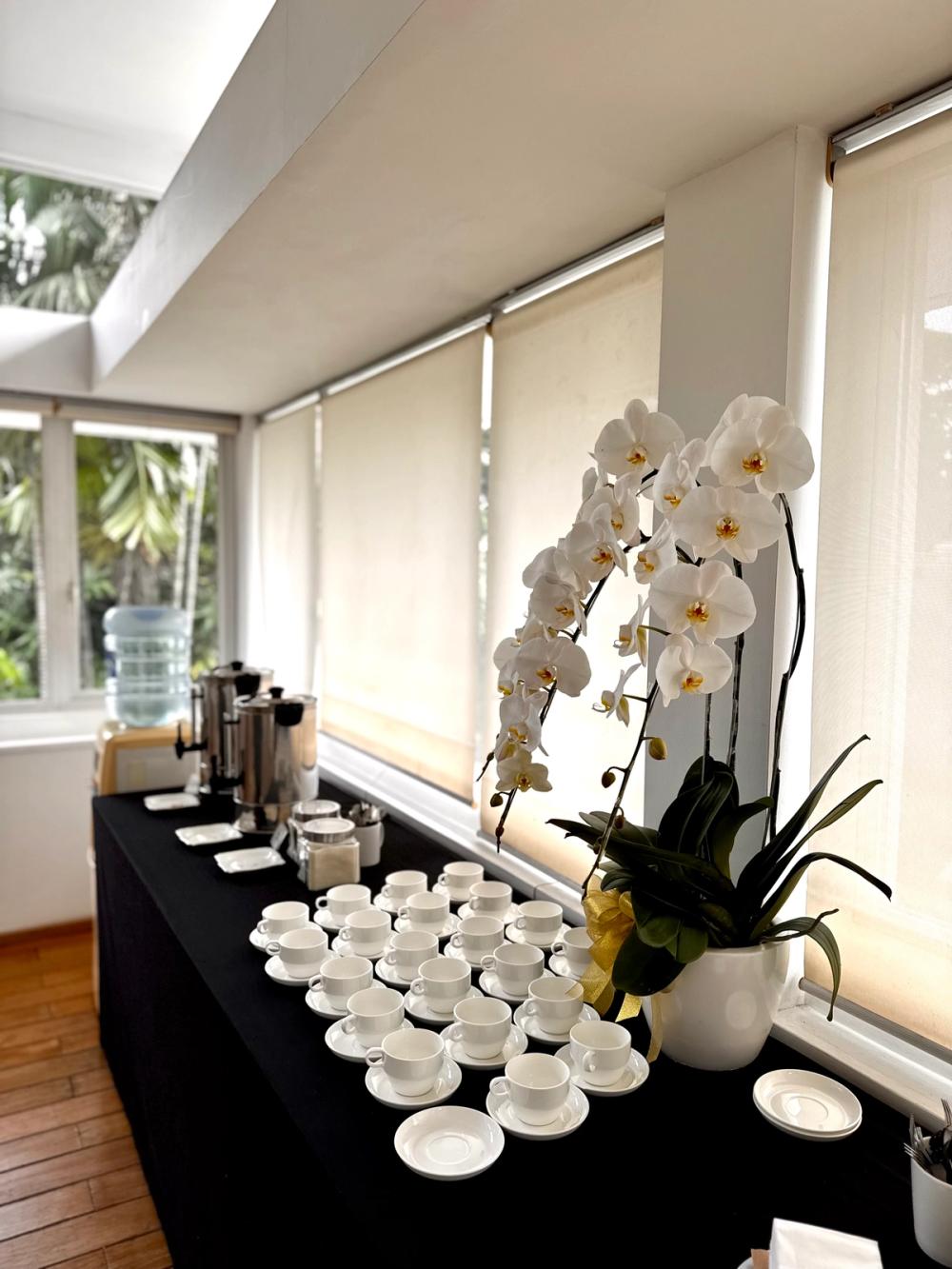 The Aster Room seen from the far end of its glass meeting table