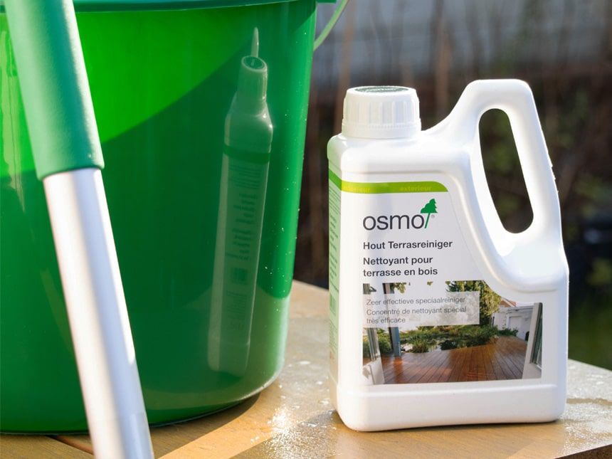 Wooden patio cleaner on a small table