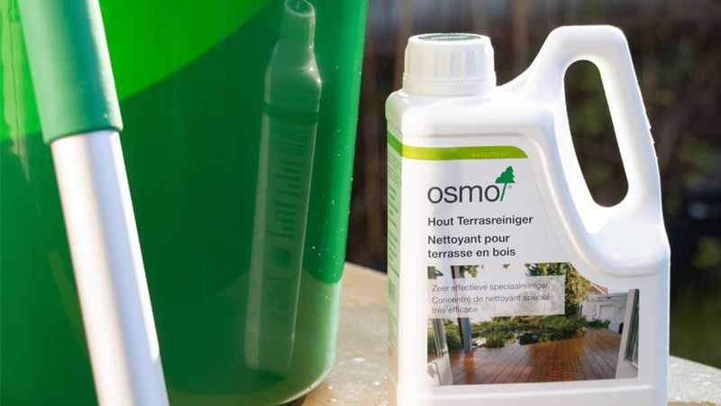 Wooden patio cleaner on a small table