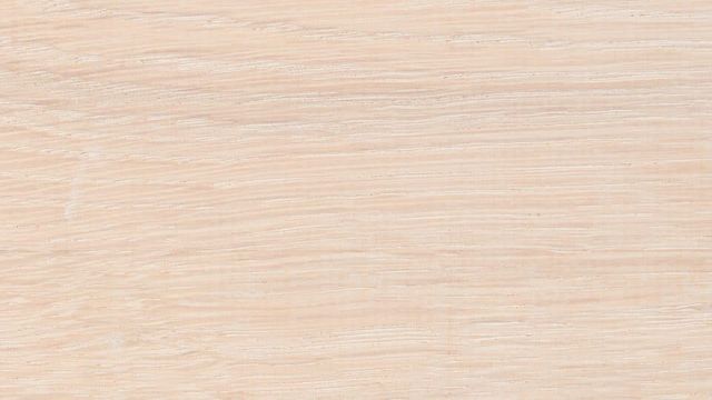 Close-up van licht, white-wash behandeld hout met fijne nerf