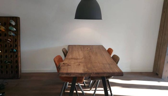 Wooden table with a lamp