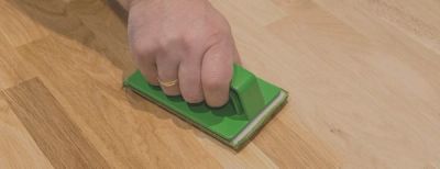 Wooden surface with an Osmo microfiber cloth