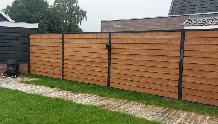 Douglas fir fence in a warm brown colour