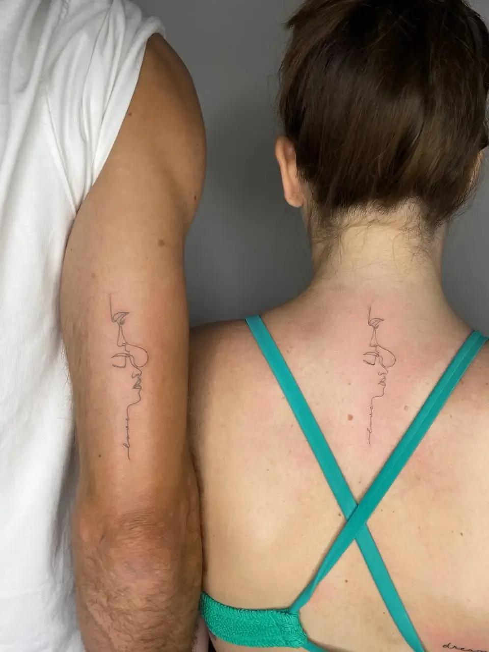 Fine line matching couples tattoo on arm and back by a professional tattoo artist in Budva Montenegro