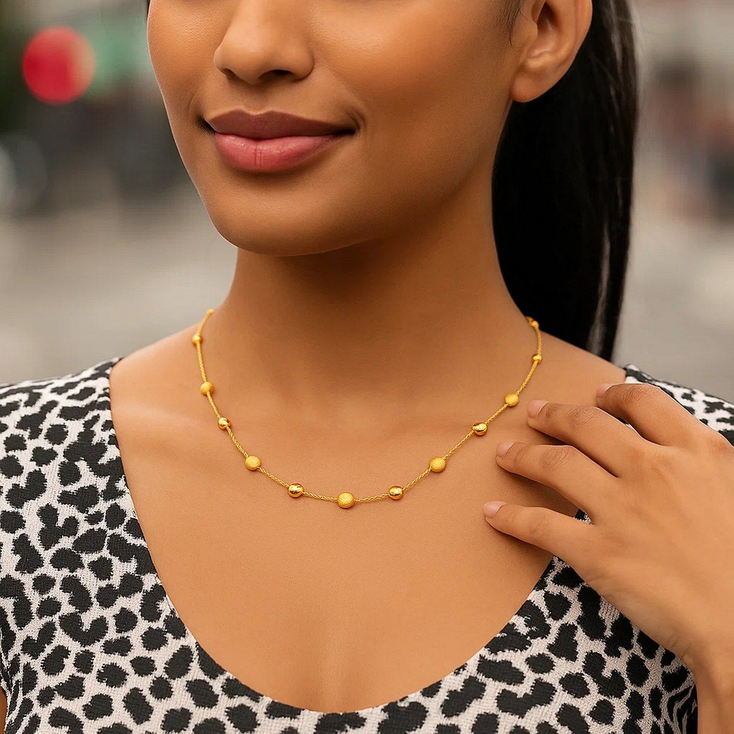 14k Yellow Gold Necklace with Polished and Textured Pebble Stations