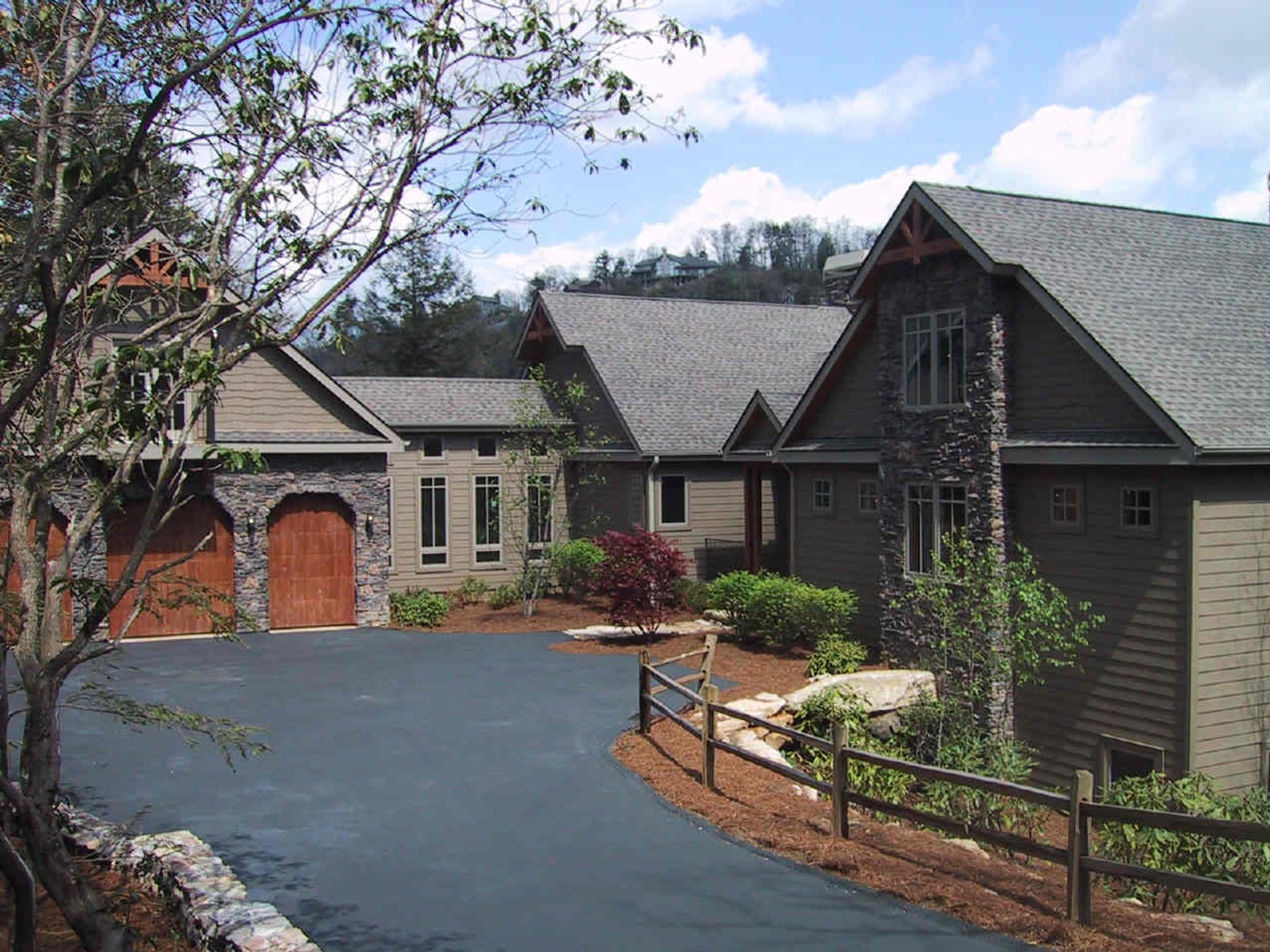 Designed using three seperate structures attached with  breezeways overlooking the mountains.