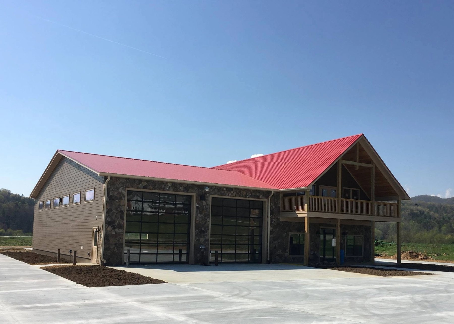 Mountain firehouse with heavy timber construction