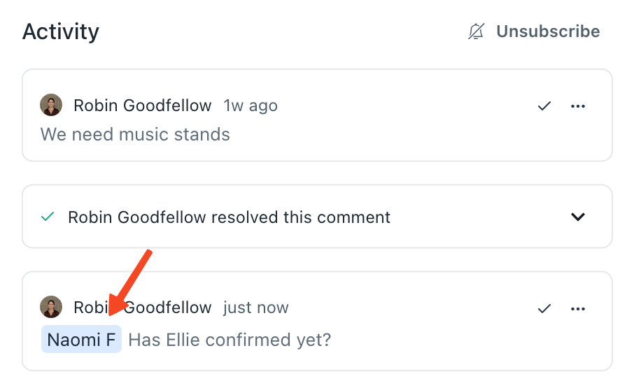Screenshot of comments on an event in Prospero.  There is an arrow pointing at an @ mention in one of the comments.