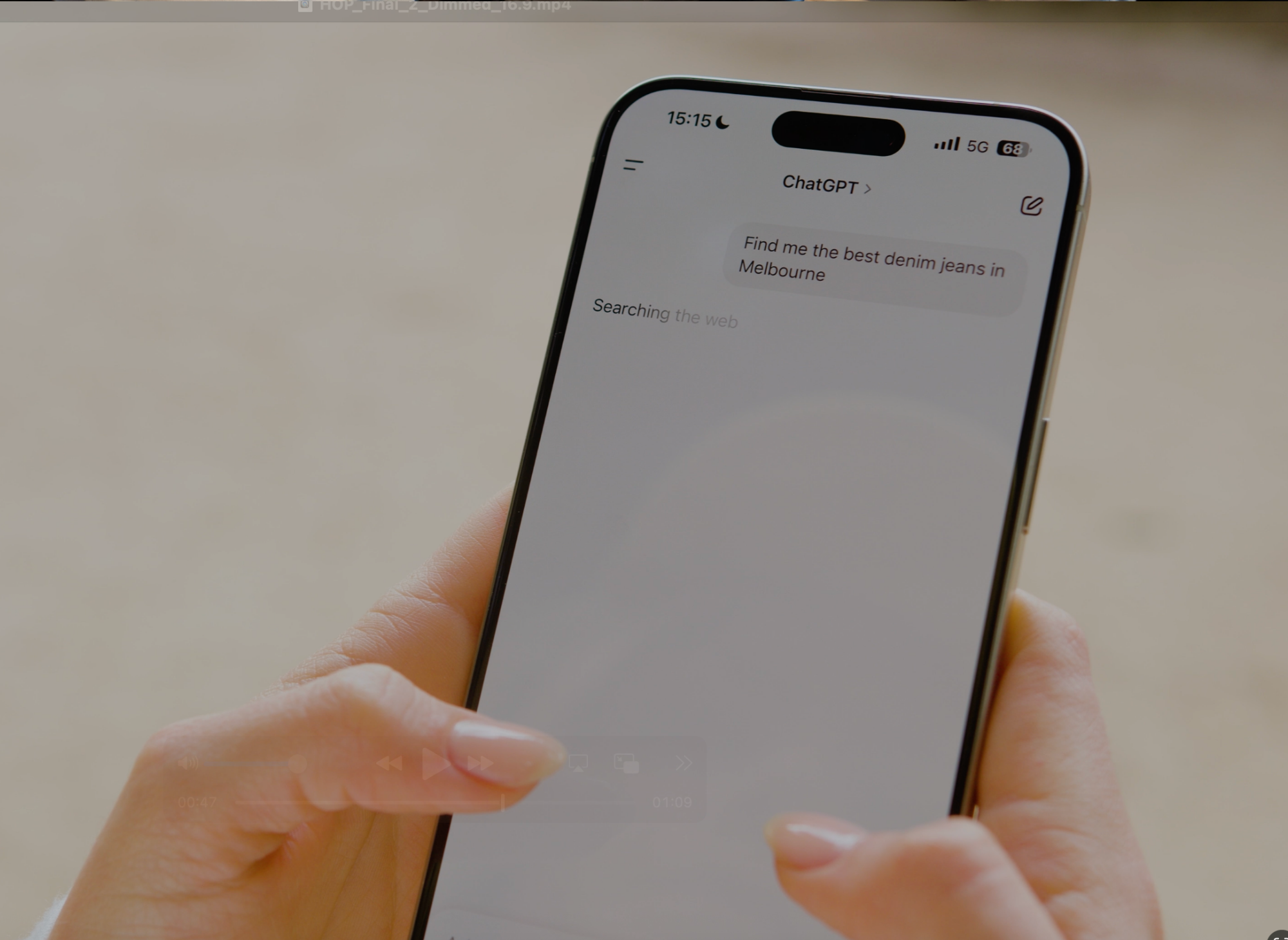 Close-up of a smartphone showing ChatGPT query “Find me the best denim jeans in Melbourne,” highlighting AI search for fashion and denim shopping in Melbourne.