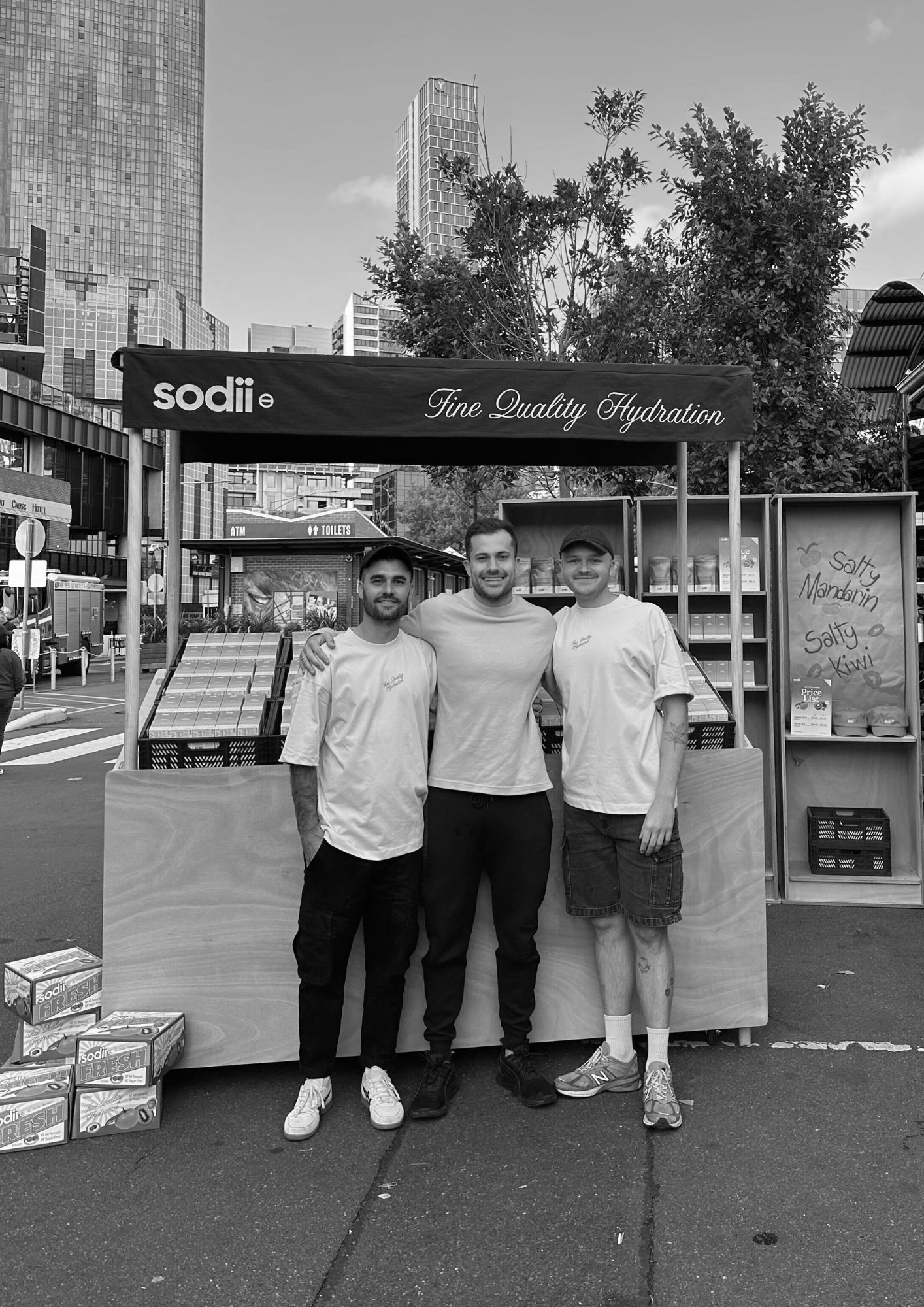 House of Psalm team with client Sodii at outdoor hydration stall in Melbourne