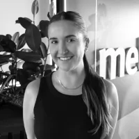 Kate Del Moro team member at Melrose Health and Best of the Bone, professional headshot in office setting