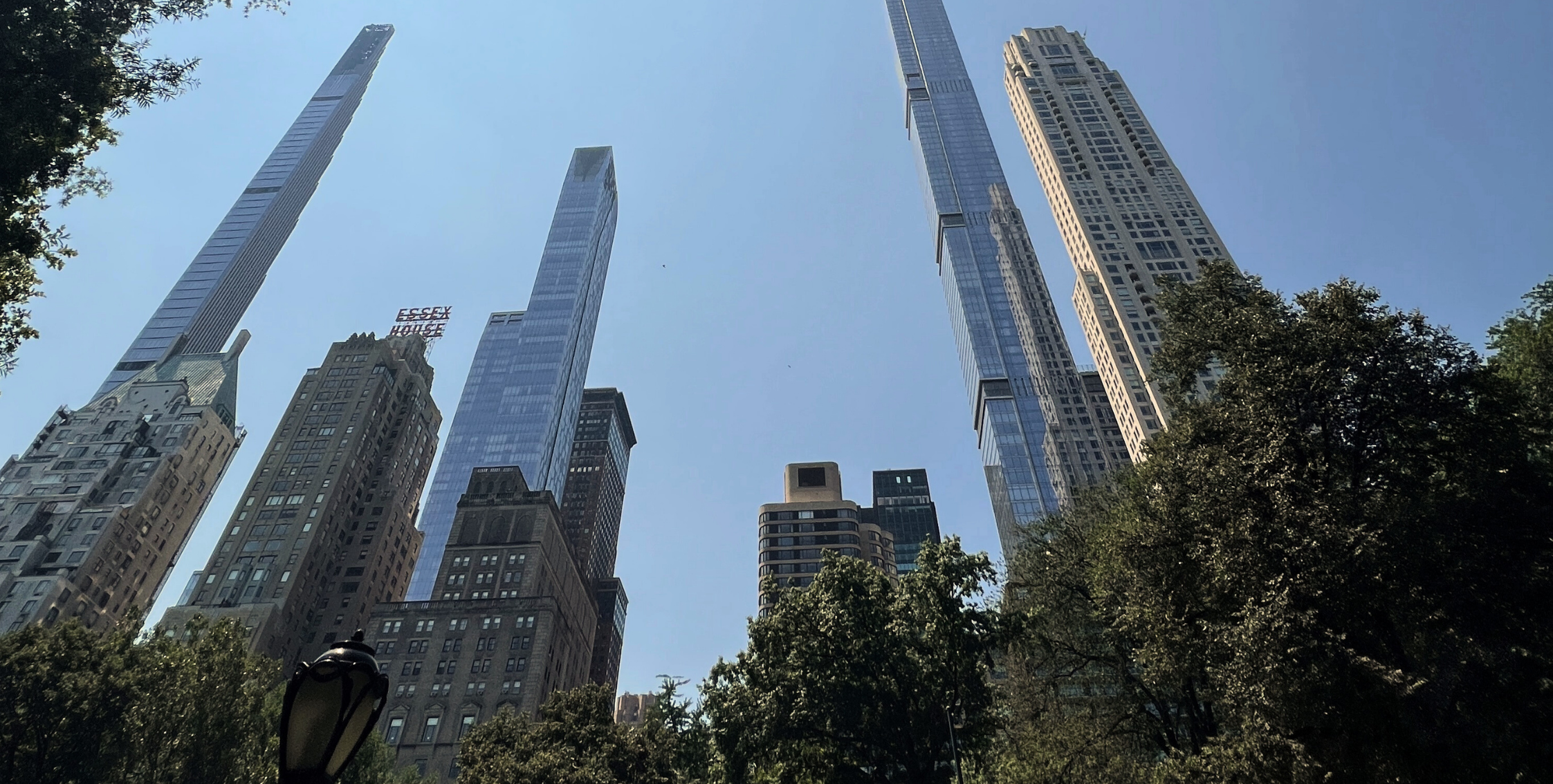 Skyscrapers in New York City skyline viewed from Central Park on a clear day