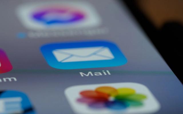 Direct mail vs email marketing for ecommerce, comparing personalized postcards and email campaigns for customer engagement, repeat purchases, and customer retention.