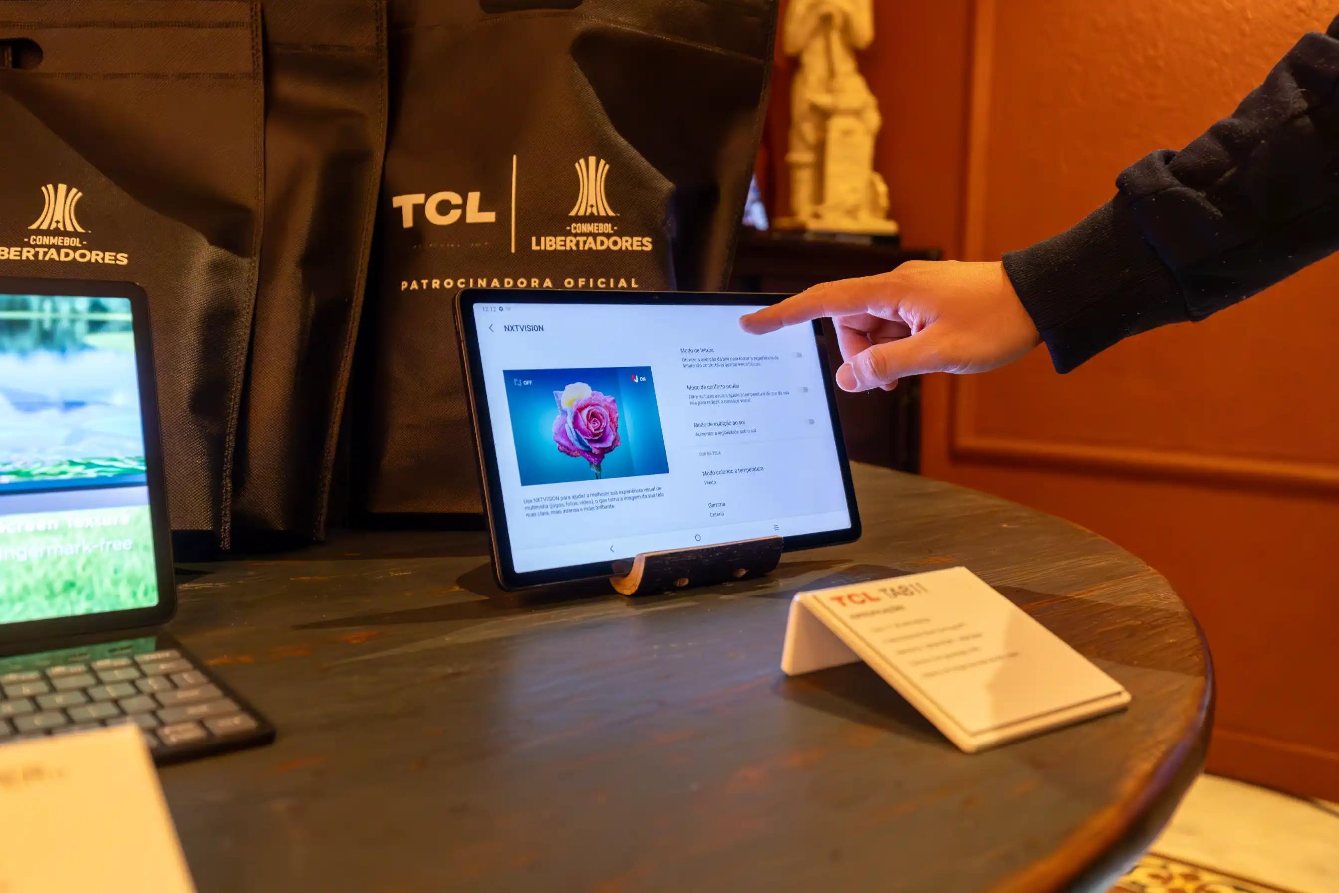 Person working at a laptop, illustrating a demo-booking campaign for a SaaS company.
