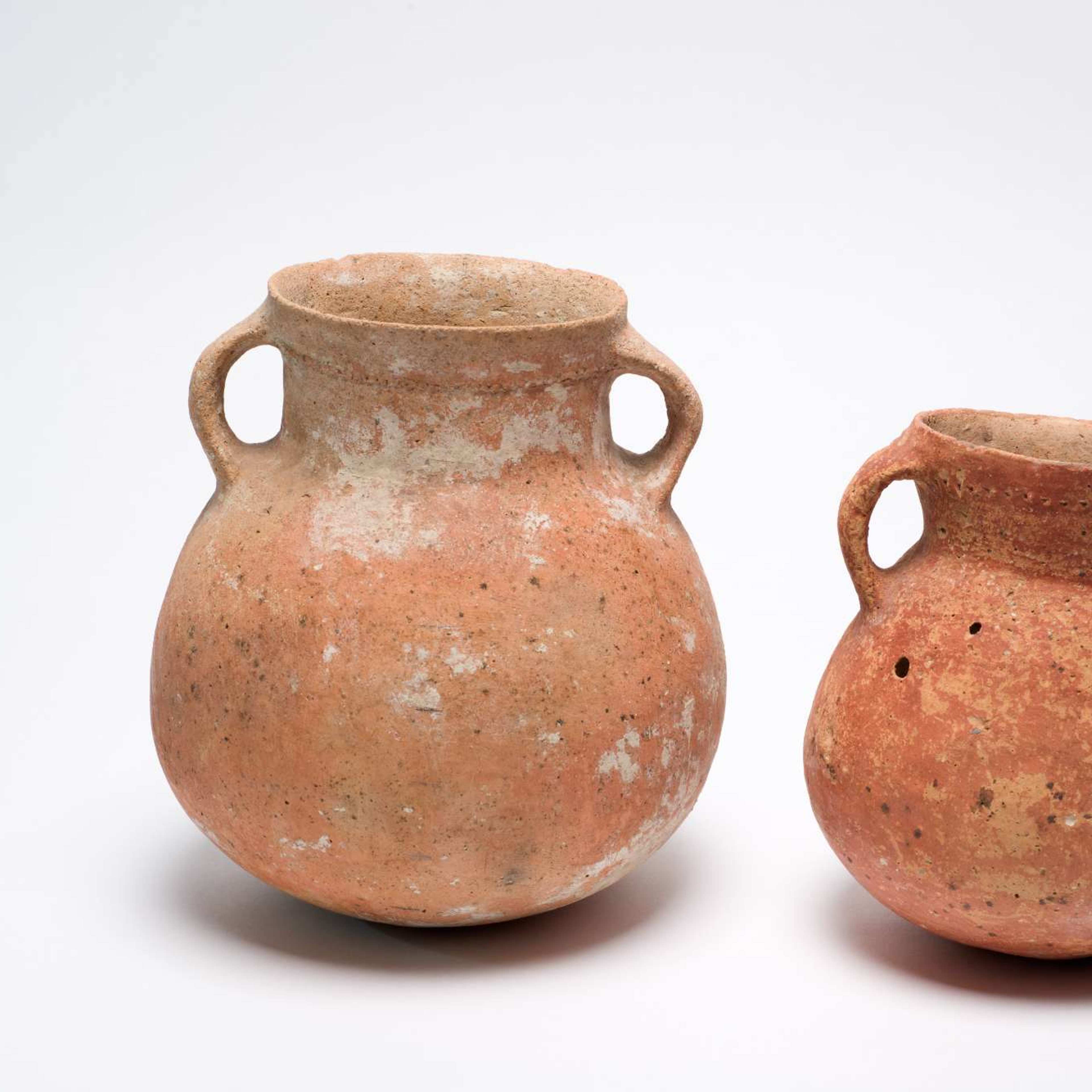 Two terracotta jars with handles