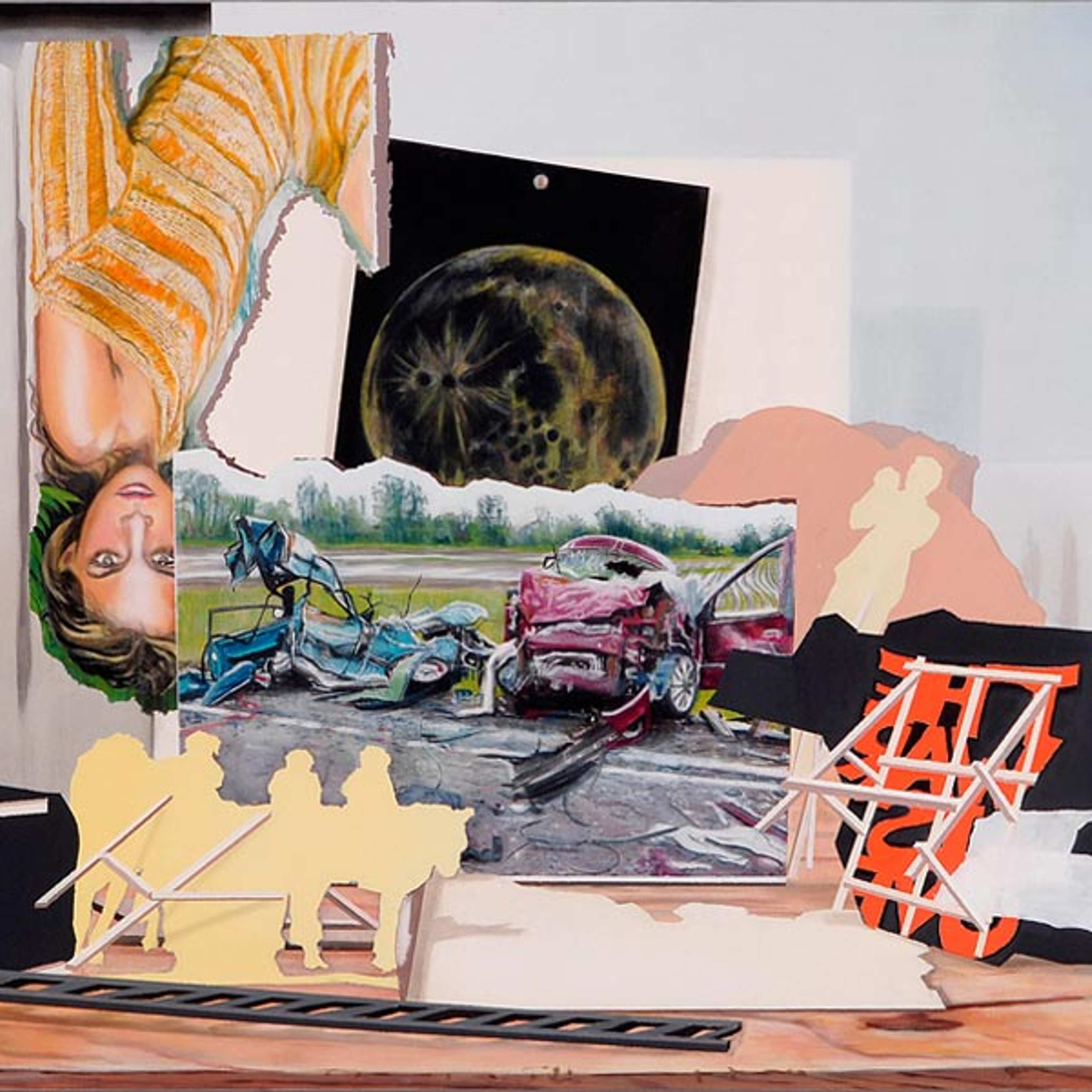 An arrangement of painted cut-outs that include an image of a car crash and an upside-down human figure