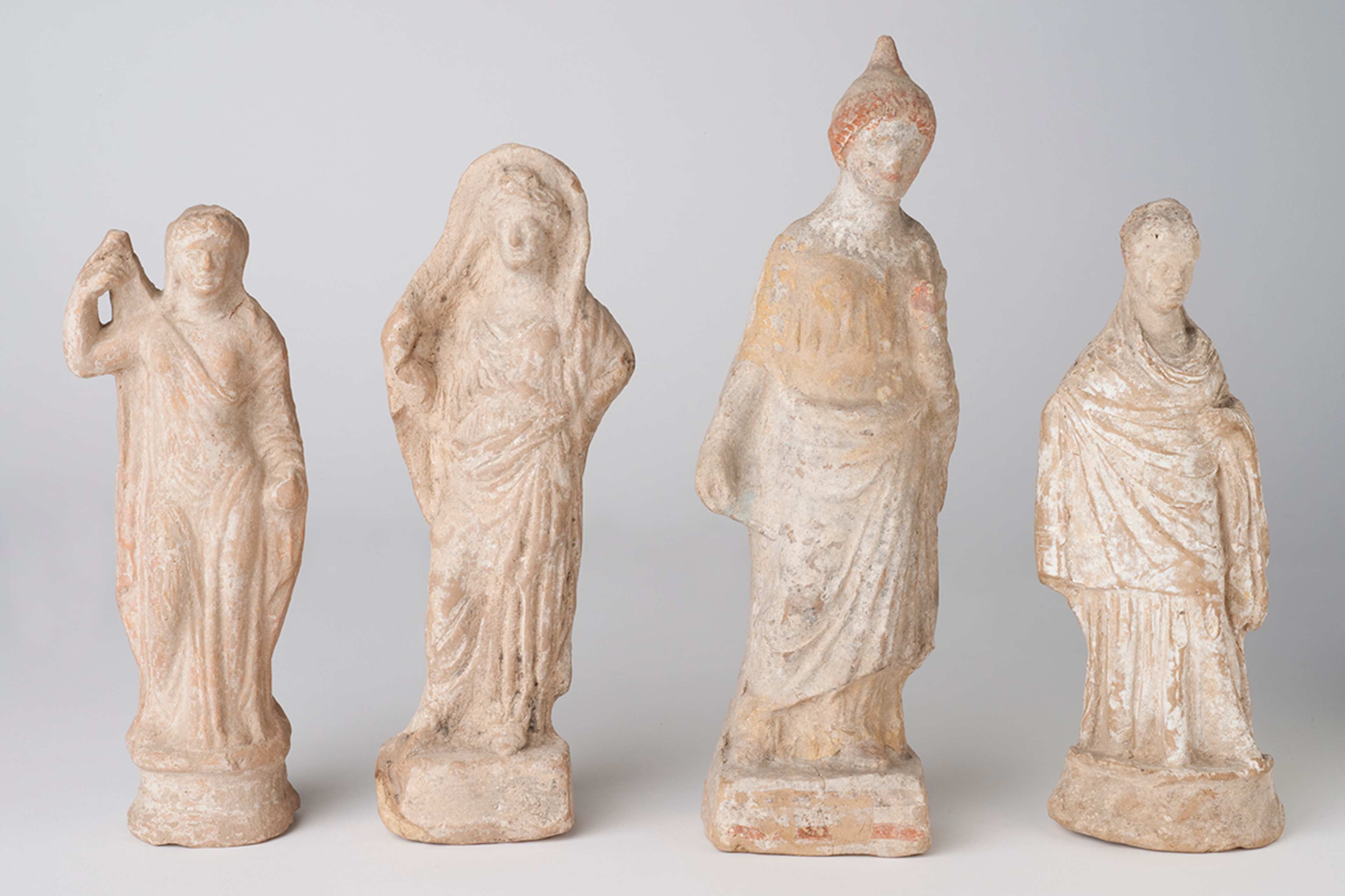 Four ancient terracotta figurines