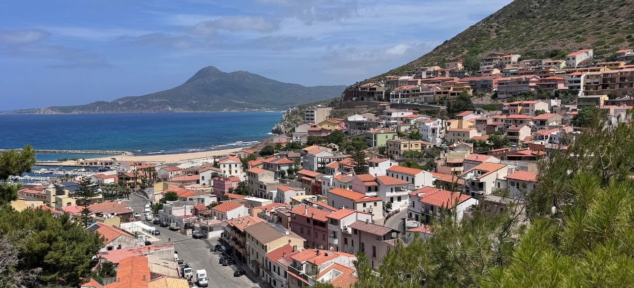Sardinian Coastal Village View with Sea and Hills