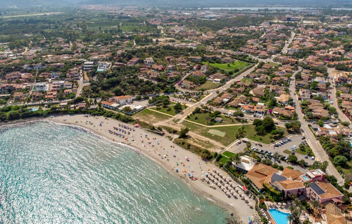 View from the drone of Porto Frailis beach with white sand and crystal clear water. Arbatax, Tortolì, Ogliastra, Sardinia, Italy