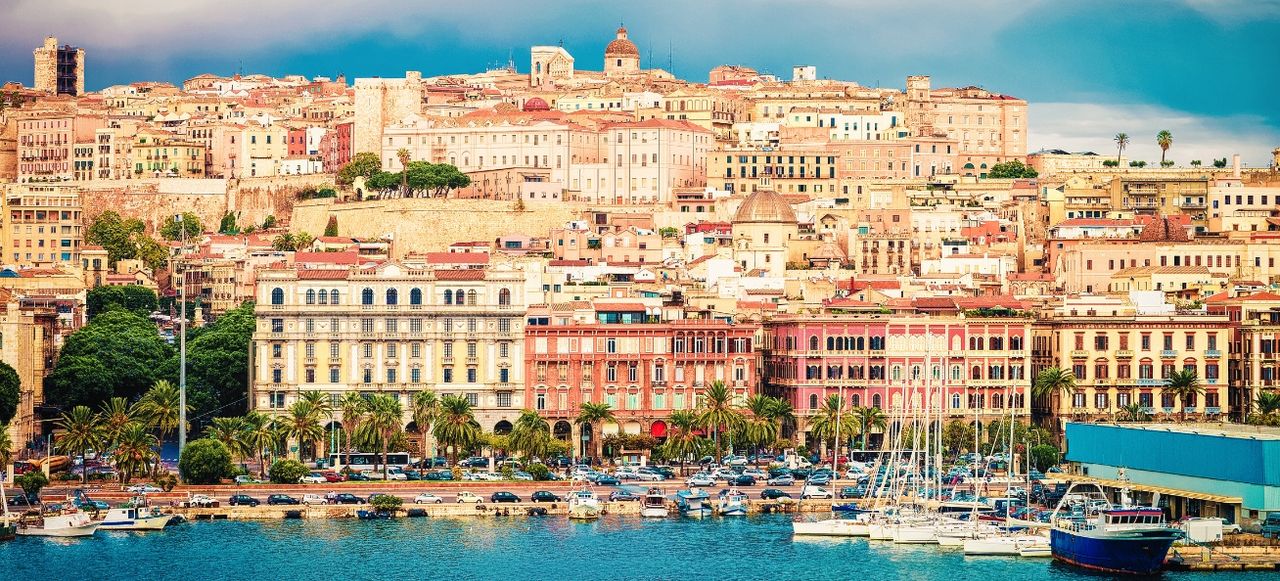 Cagliary cityscape with architecture and Mediterranean Sea in Sardinia Italy