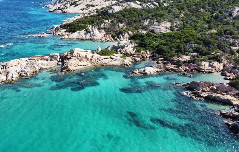 The aerial view of a beautiful beach with turquoise water