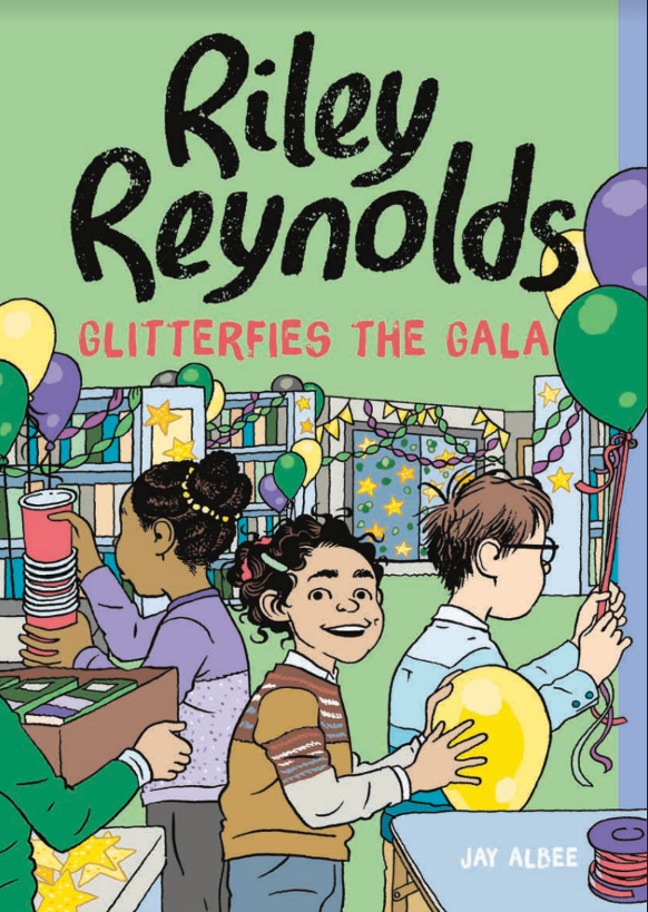 Cover illustration for Riley Renolds Glitterfies the Gala by Jay Albee shows Riley Reynolds, nonbinary fourth grader, smiling and holding a balloon in a public library local branch. The bookshelves are decorated with streamer and balloons. Beside Riley, their friends tie balloons together and unpack a sleeve of plastic cups. - Image credit Cover illustration by J. Anthony