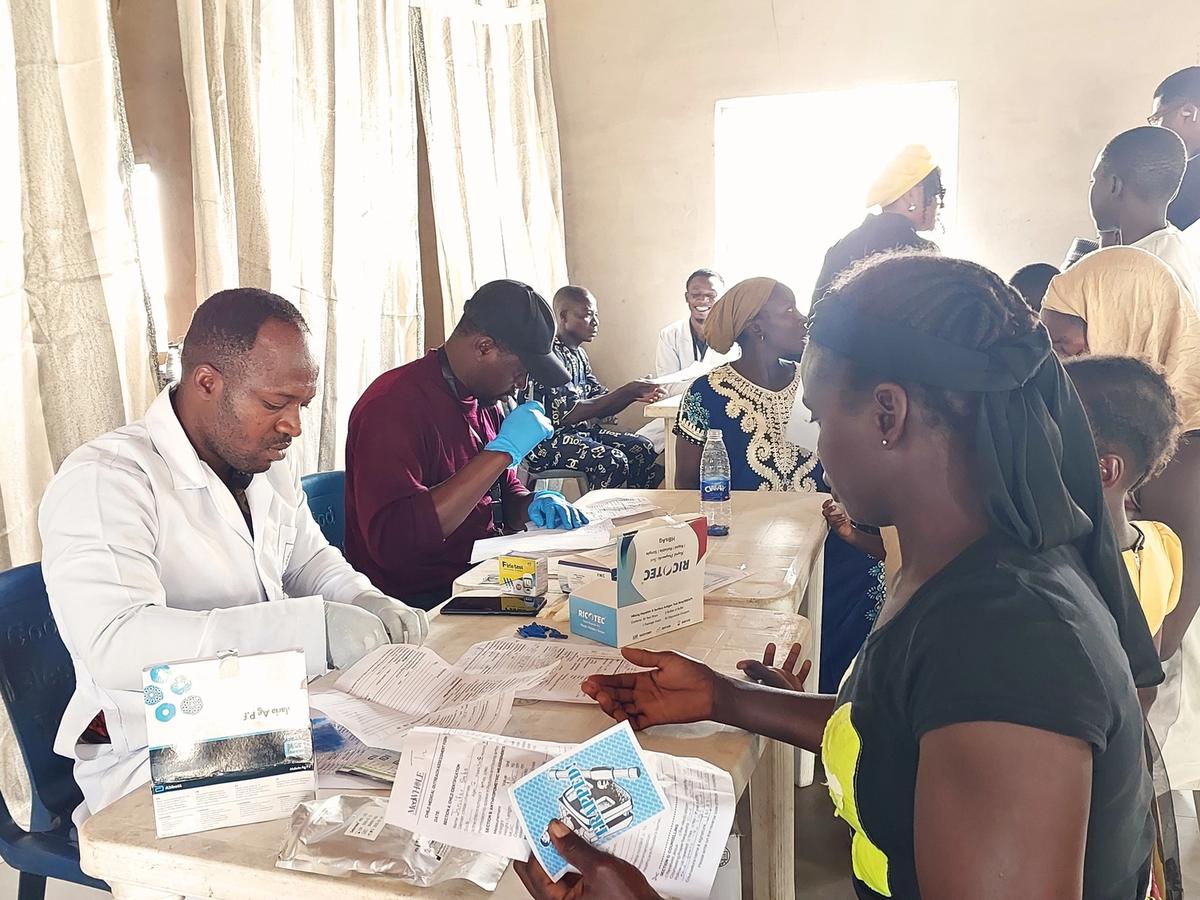 Health workers conducting assessments during the Kunyami outreach