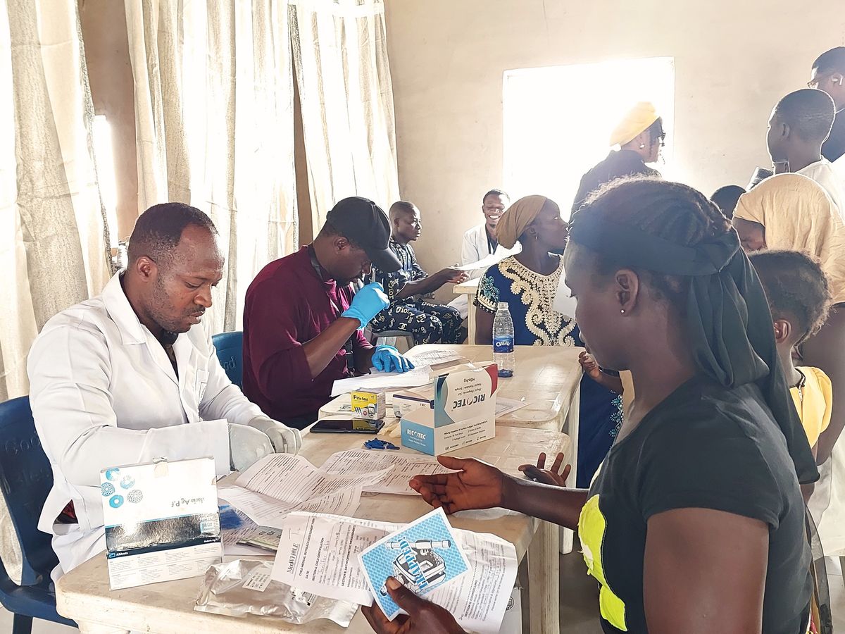 Health workers conducting assessments during the Kunyami outreach