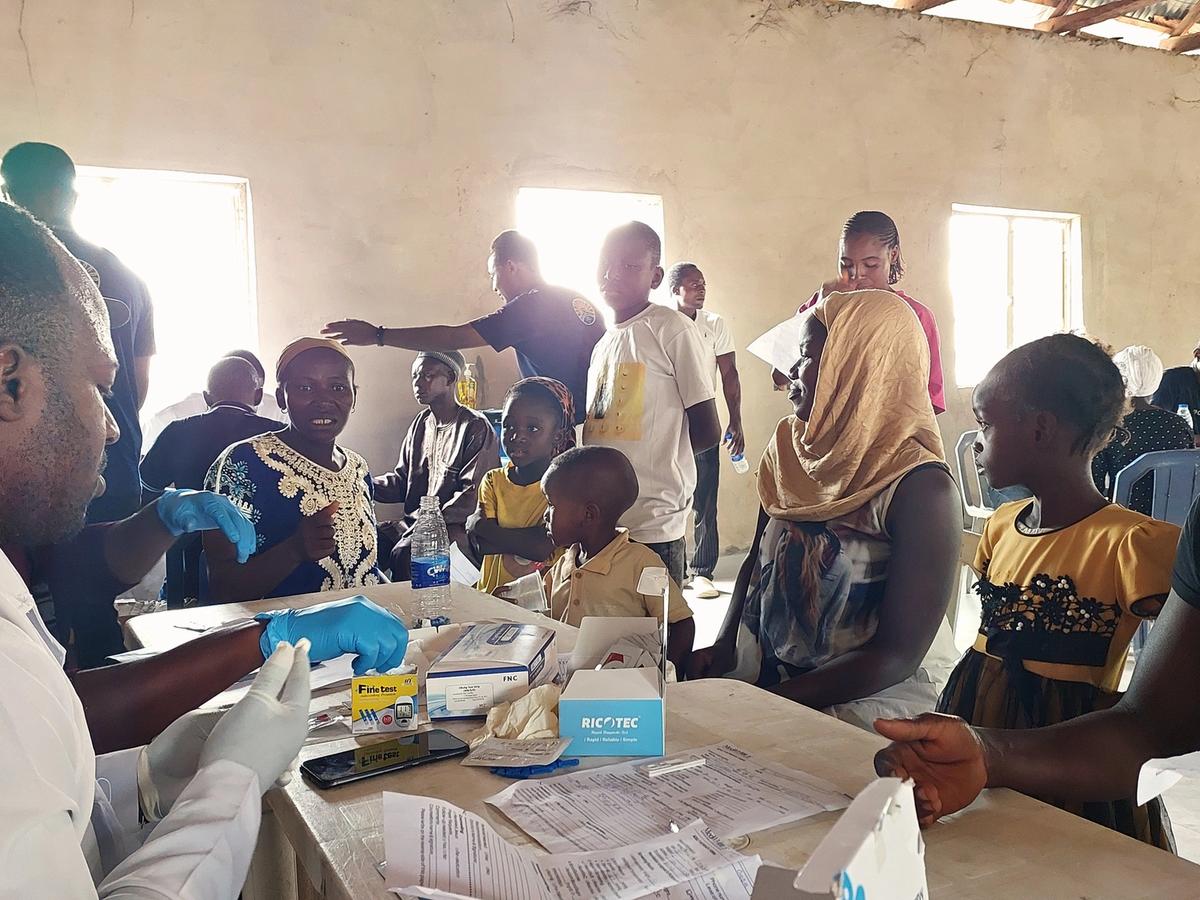 MedWHOLE health workers serving community members in Kunyami