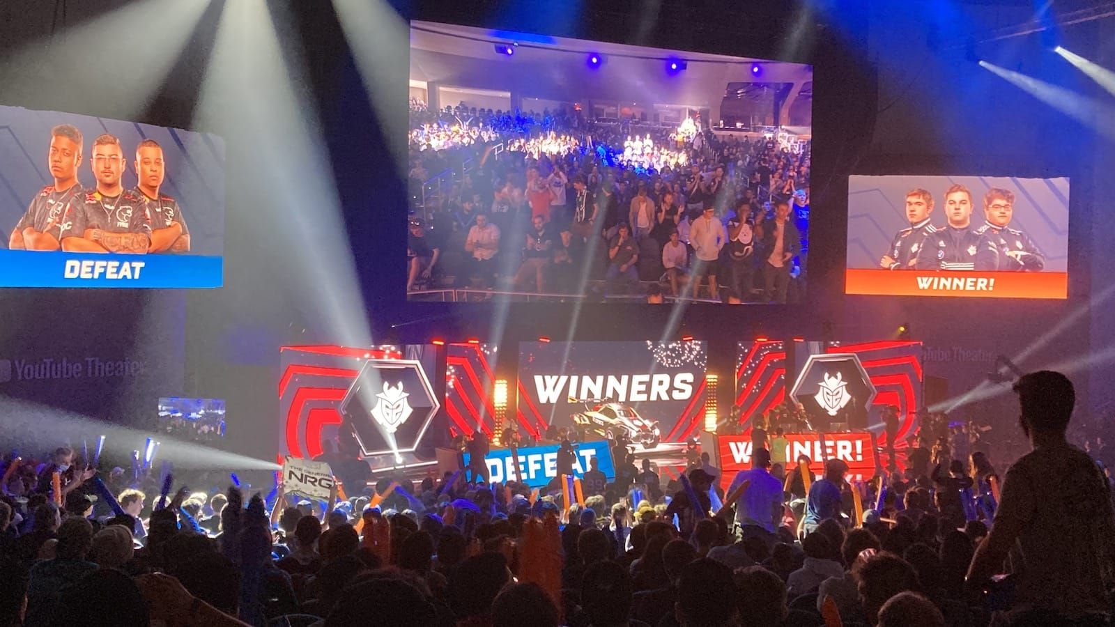 View of the stage from the crowd at a Rocket League tournament as G2 has just picked up a win