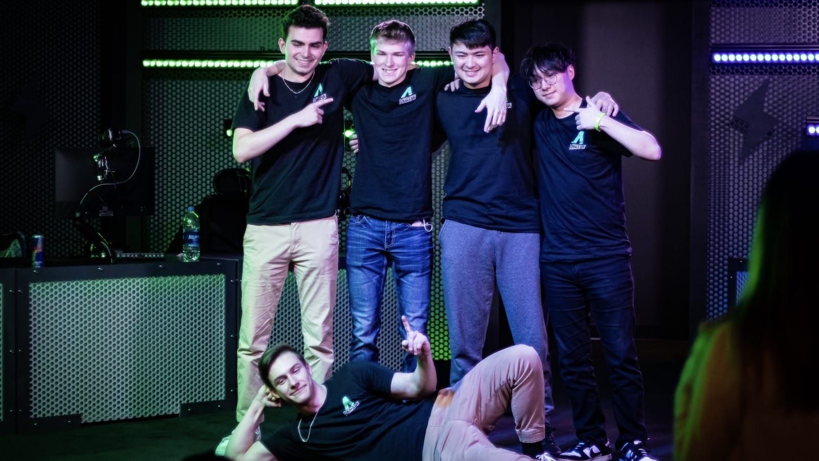 Akrew Valorant team pose on stage after winning a tournament