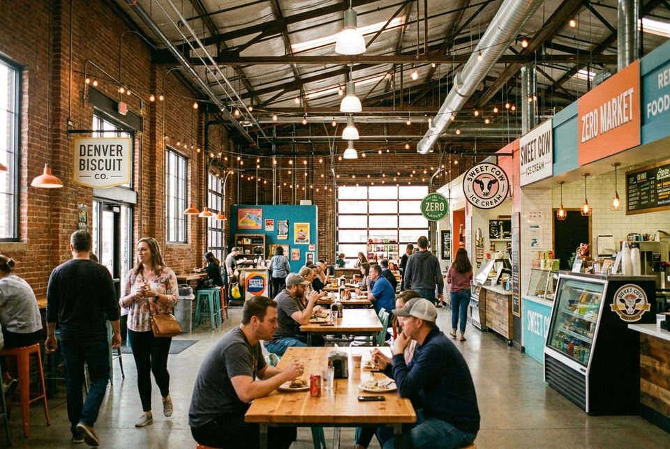 Stanley Marketplace in Aurora Colorado trendy food hall with brick walls and local restaurants