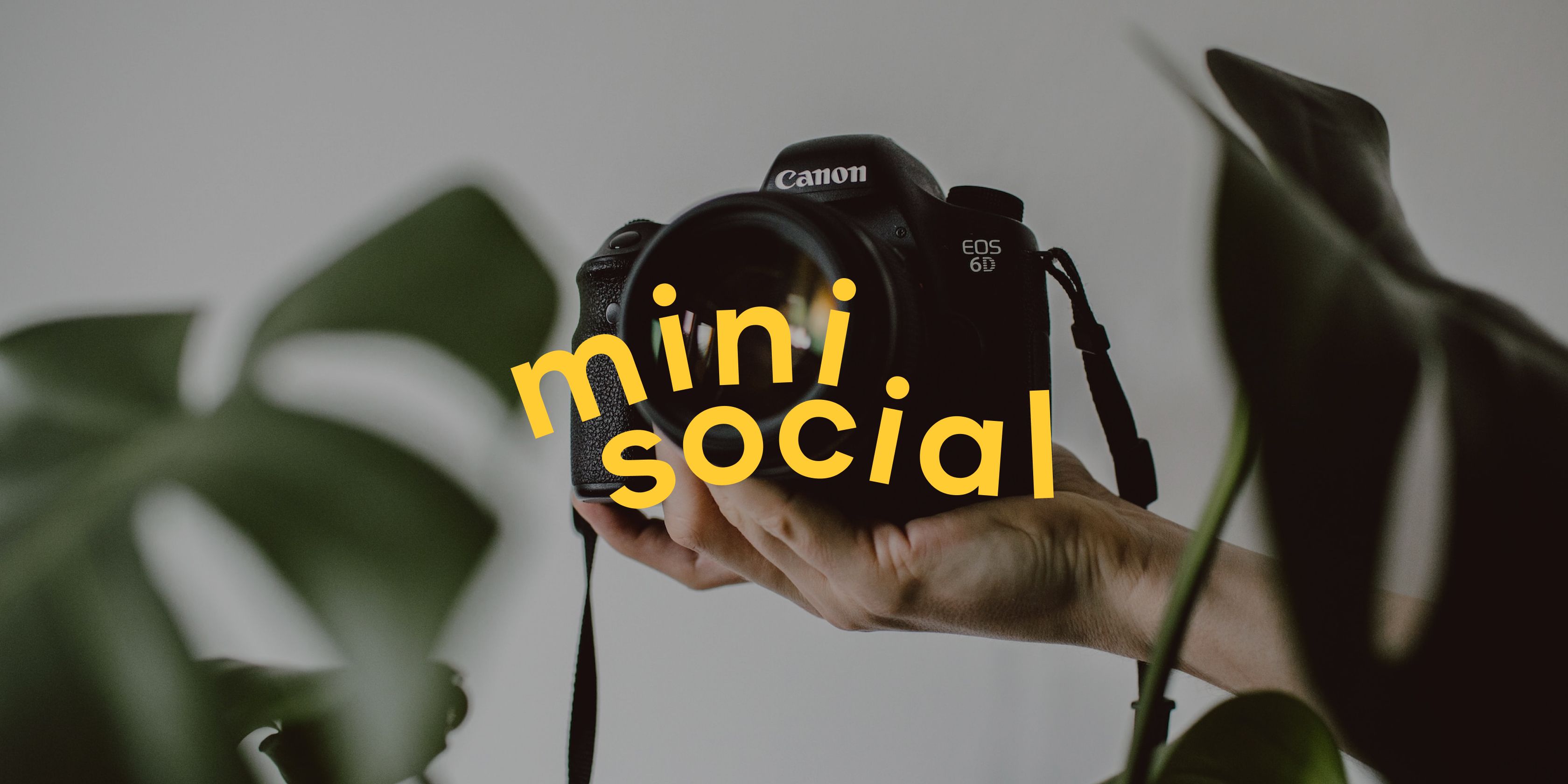 Minisocial logo over man holding a camera