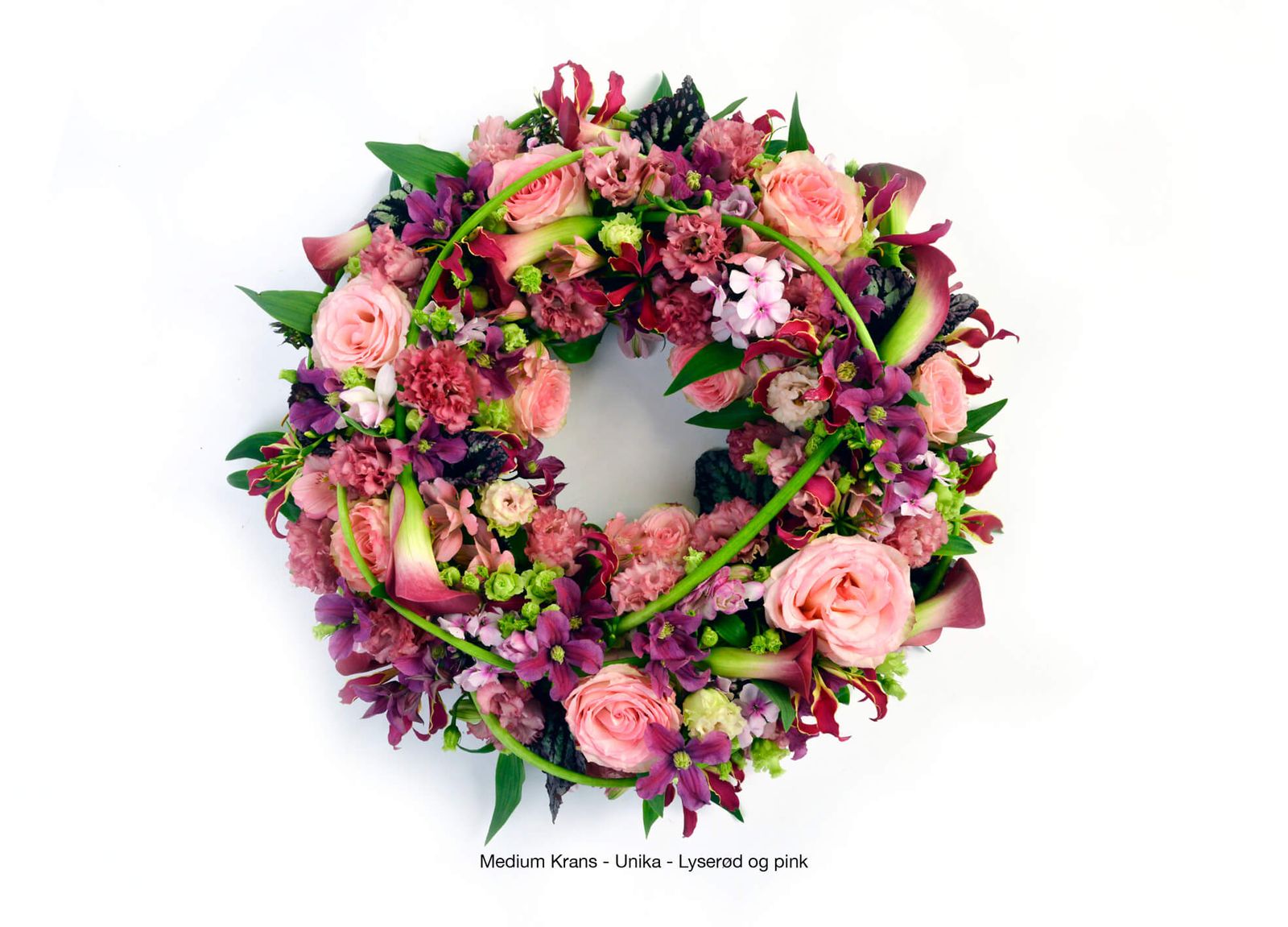 Photography and graphic design of pink funeral wreath arrangement for florist catalogue