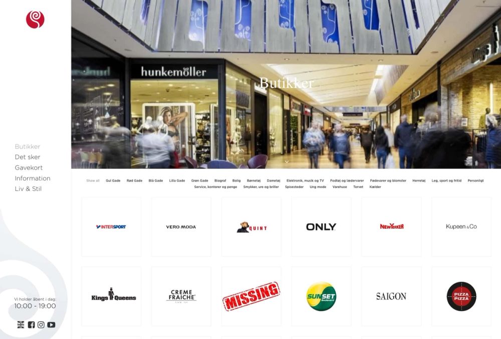 Store directory interface with integrated Instagram feed for shopping center website