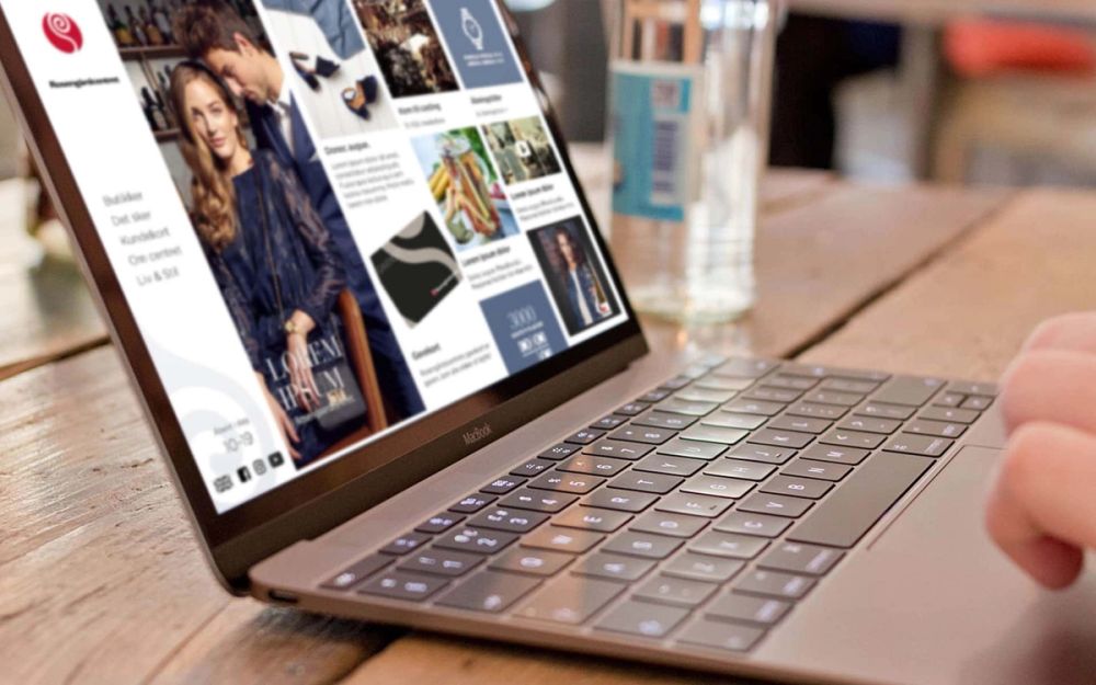 Article section UI design showcasing image layouts, copy and product directory on laptop display