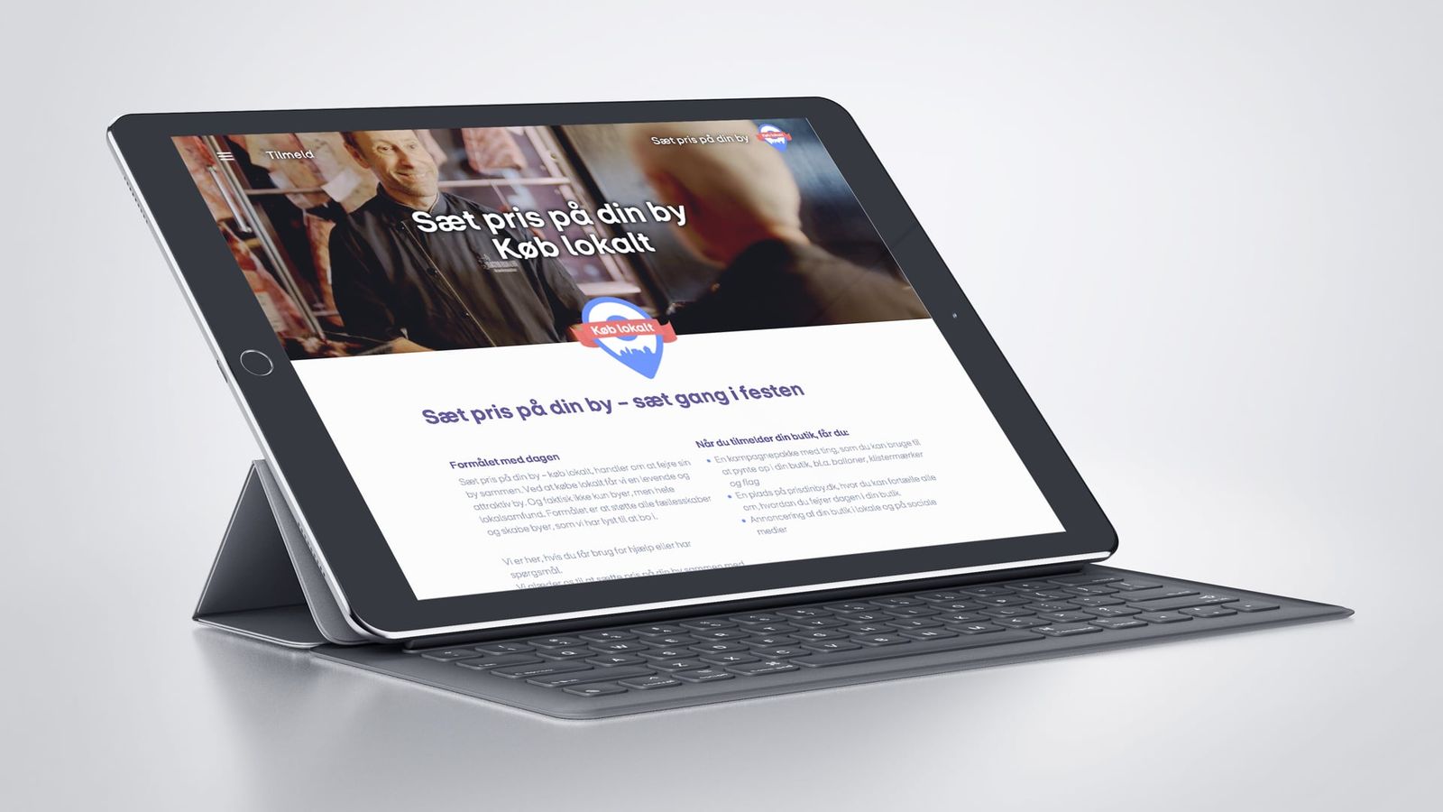 Webportal-design til køb lokalt-kampagne på iPad, viser responsive interface med kampagnevisuals og lokale tilbud