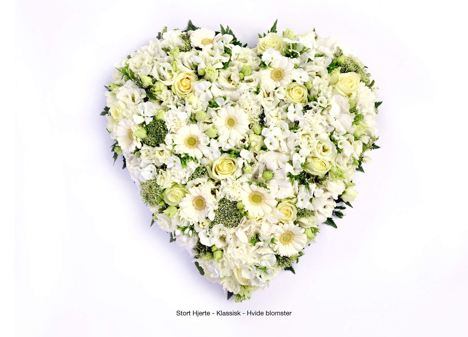 White floral heart arrangement featuring roses, gerberas and hydrangeas for funeral catalogue layout