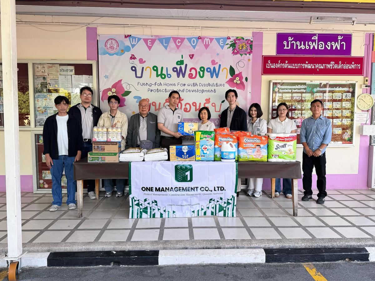 ONE-M team members presenting essential supplies during a CSR activity at Ban Fueng Fah Home for the Disabled in Nonthaburi.
