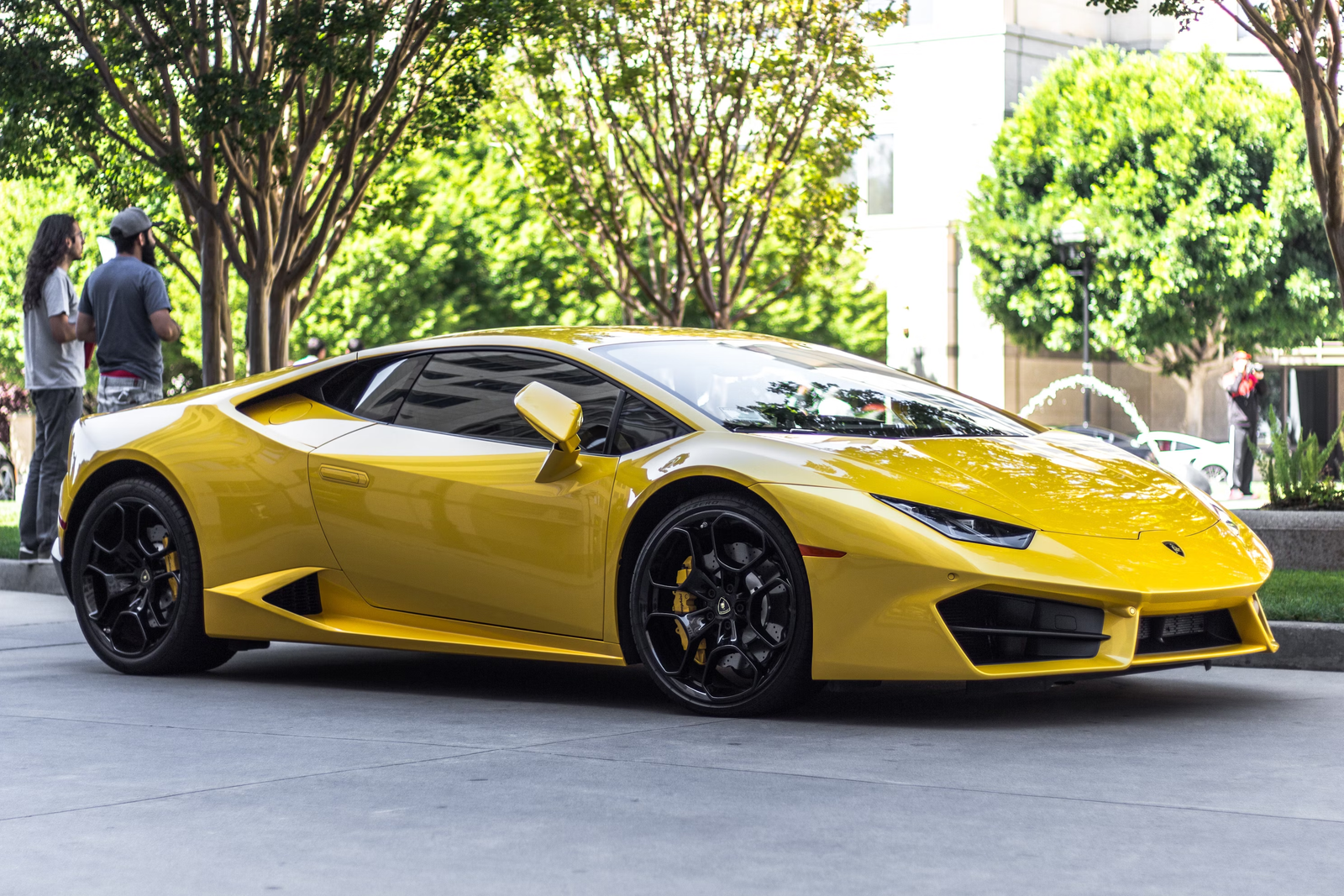 Yellow supercar on a city street