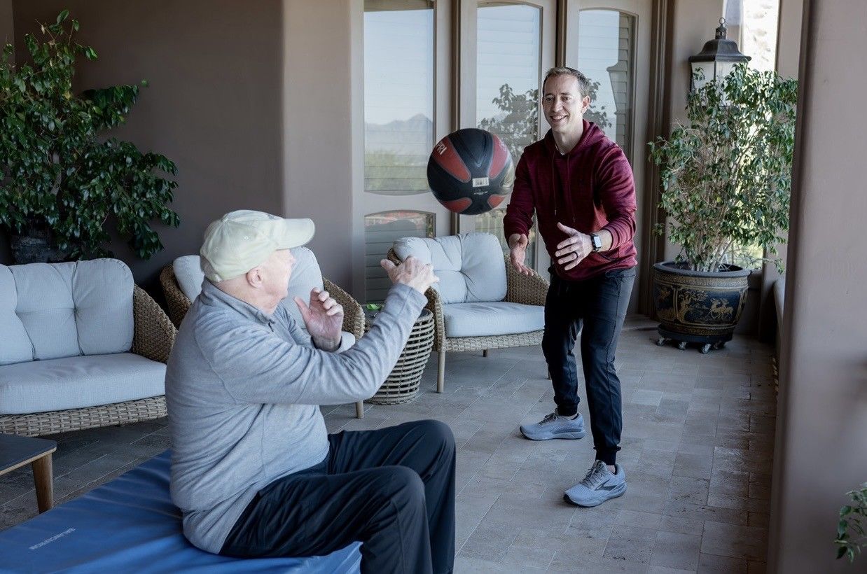 A personal trainer coaching a client