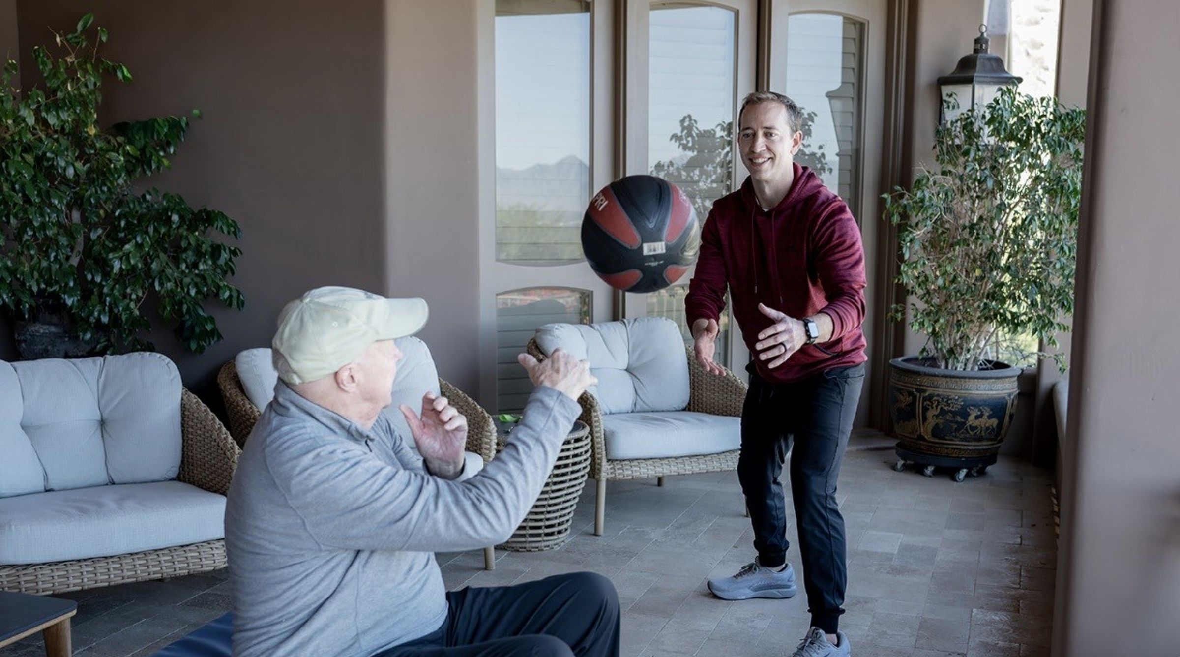A personal trainer coaching a client