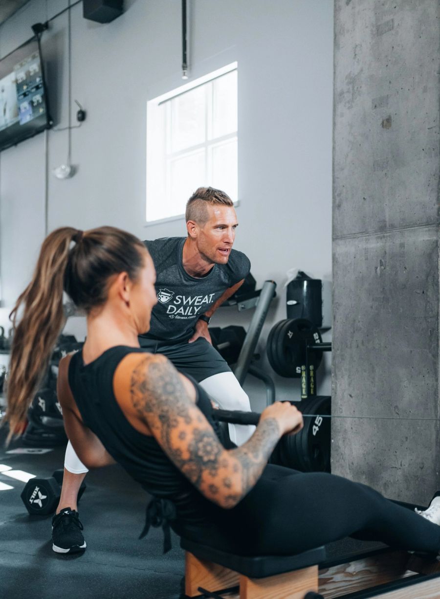 A man and woman training side by side
