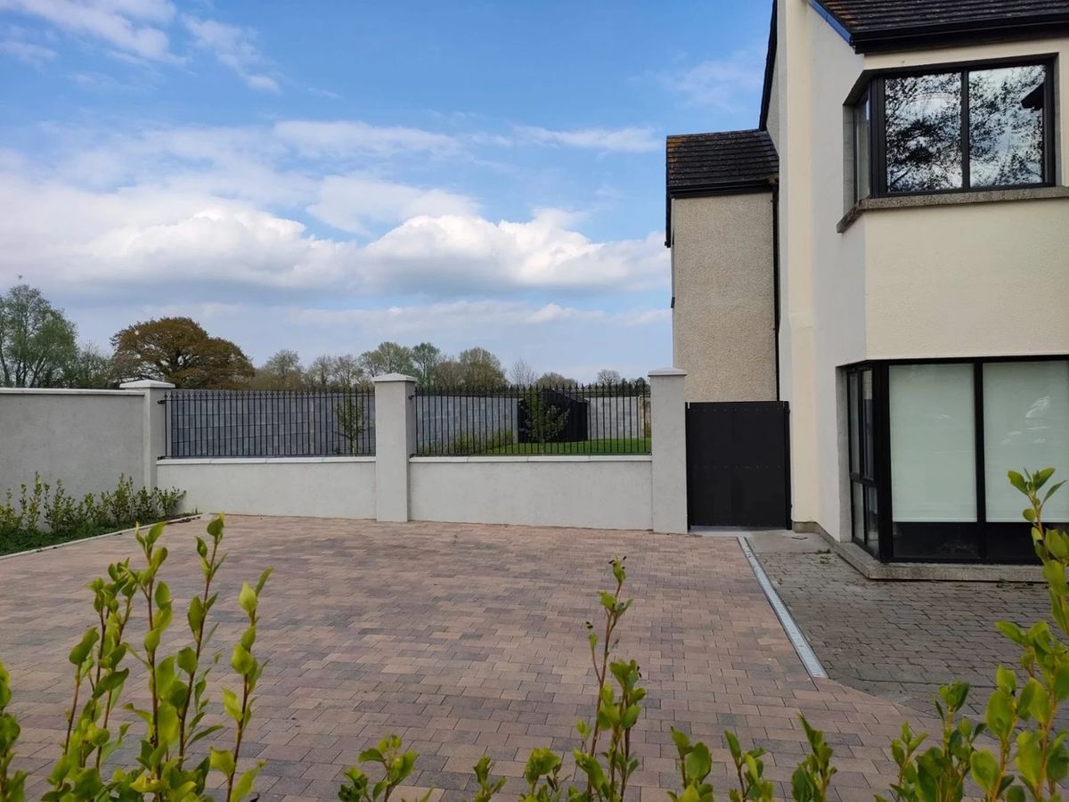 Railings and a side gate finished at a house