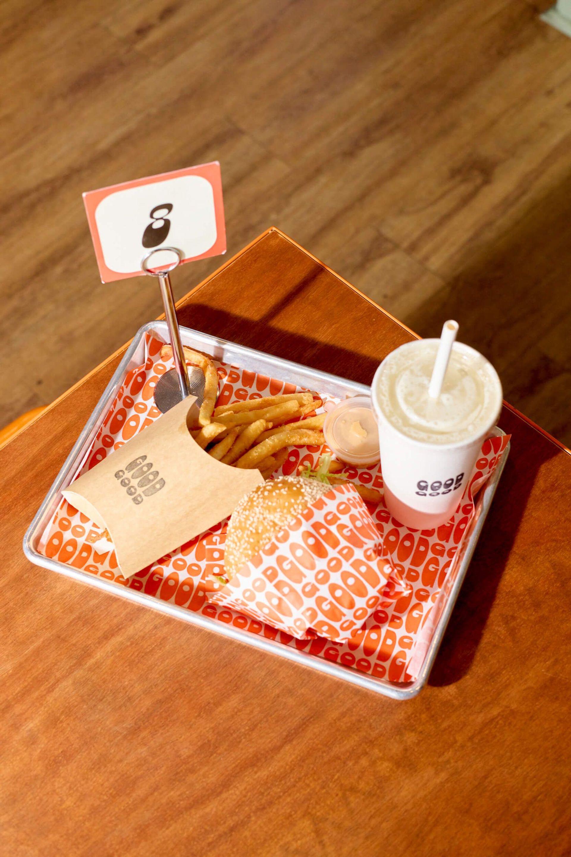 Tray with burger, fries and a drink
