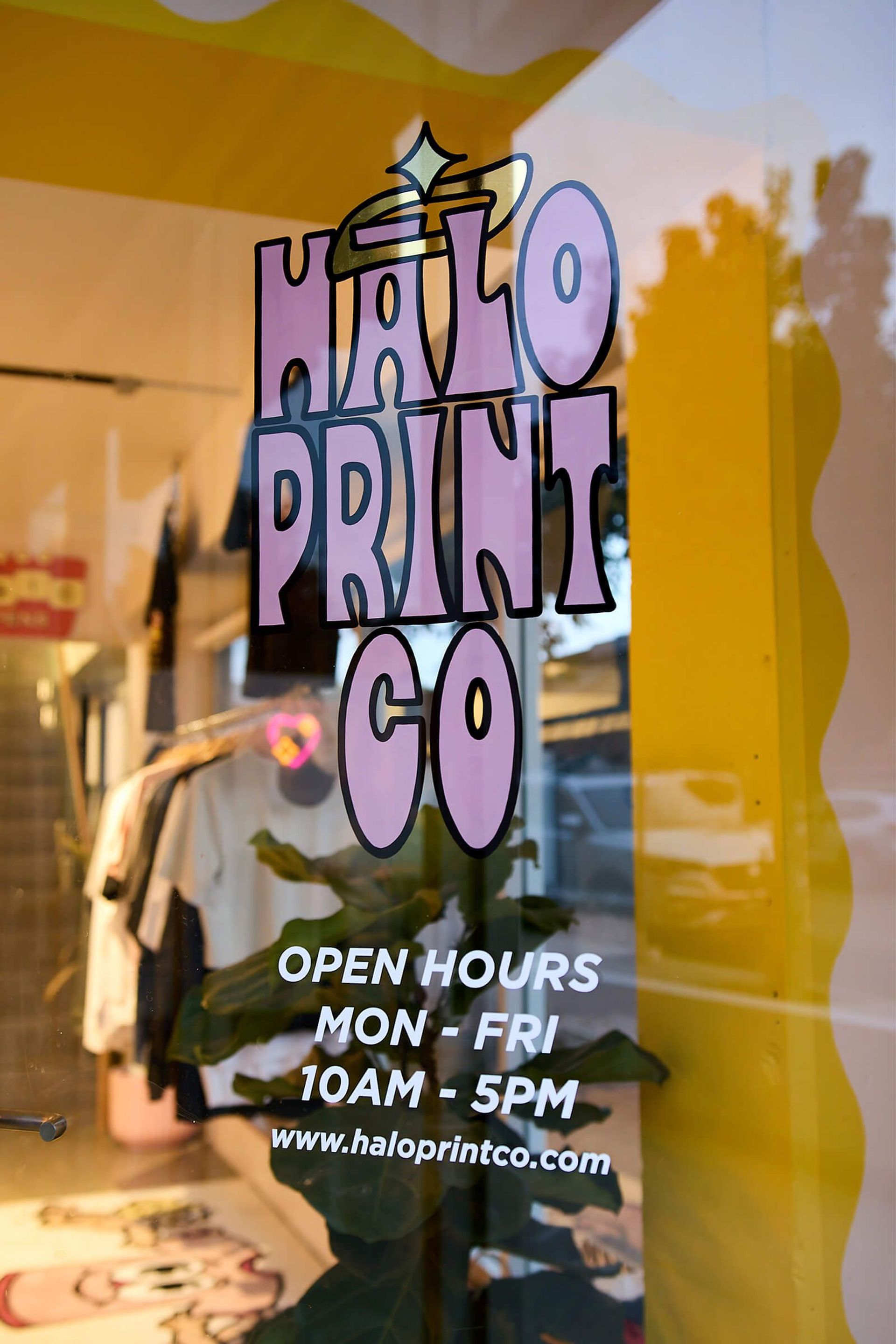 Halo Print Co trading hours on shopfront door
