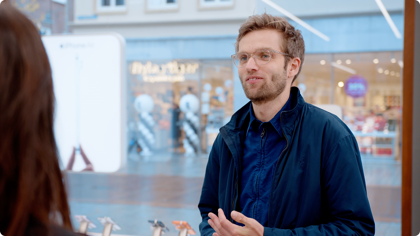 Store associate interacting with customer